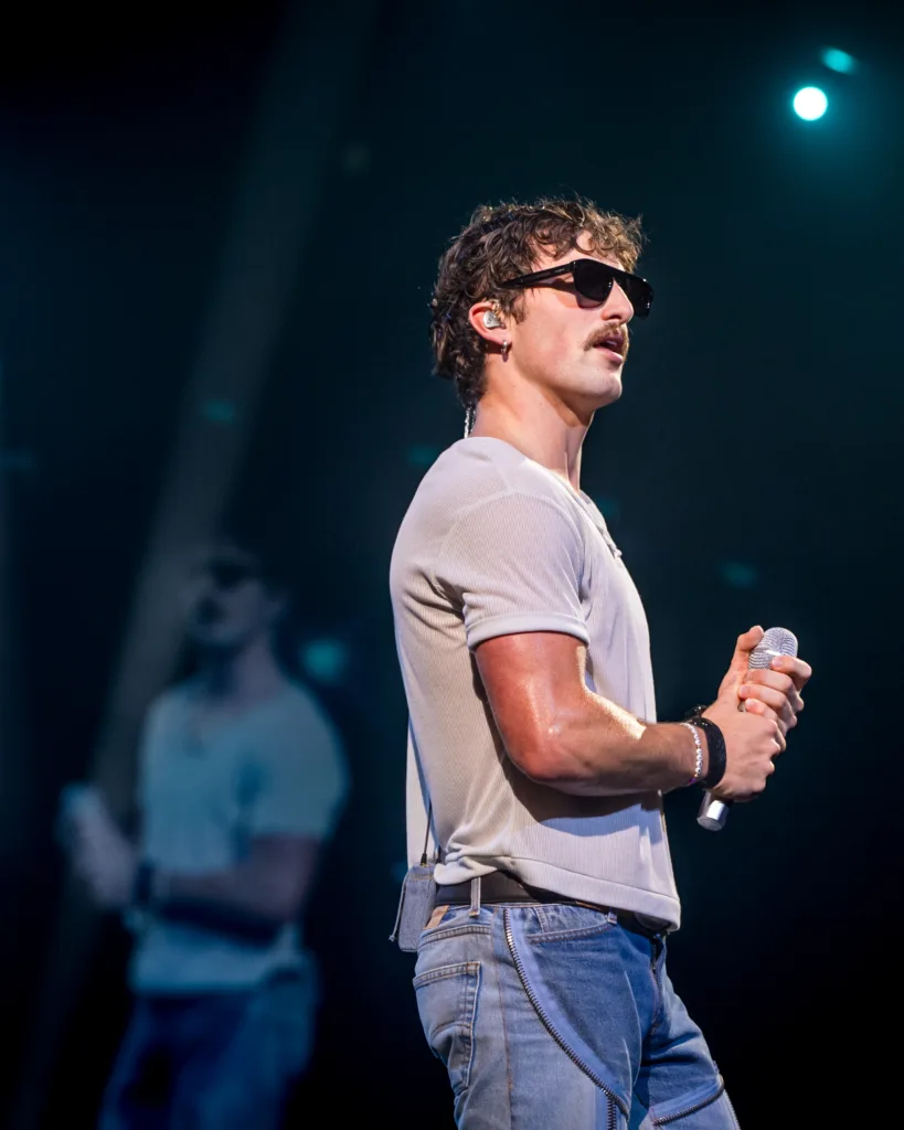 Benson Boone performing live in concert