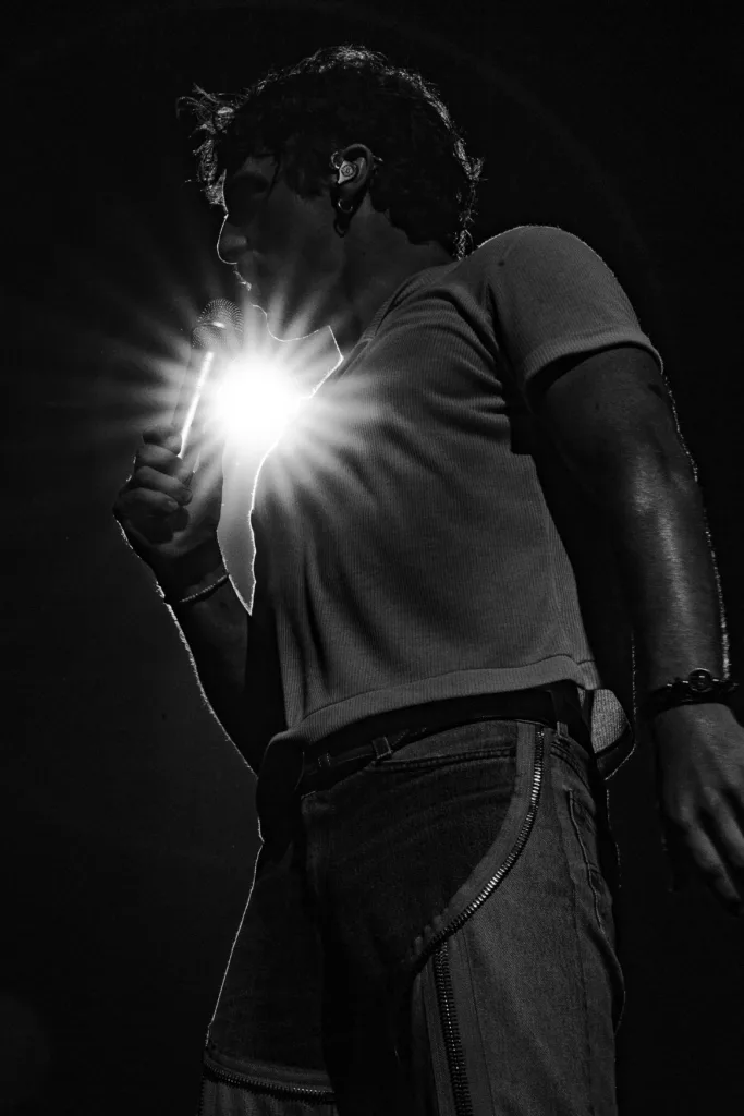 Benson Boone performing live in concert