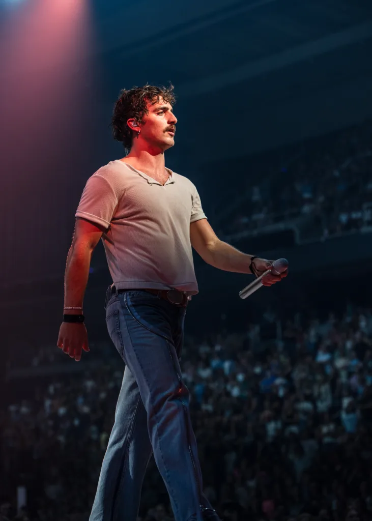 Benson Boone performing live in concert