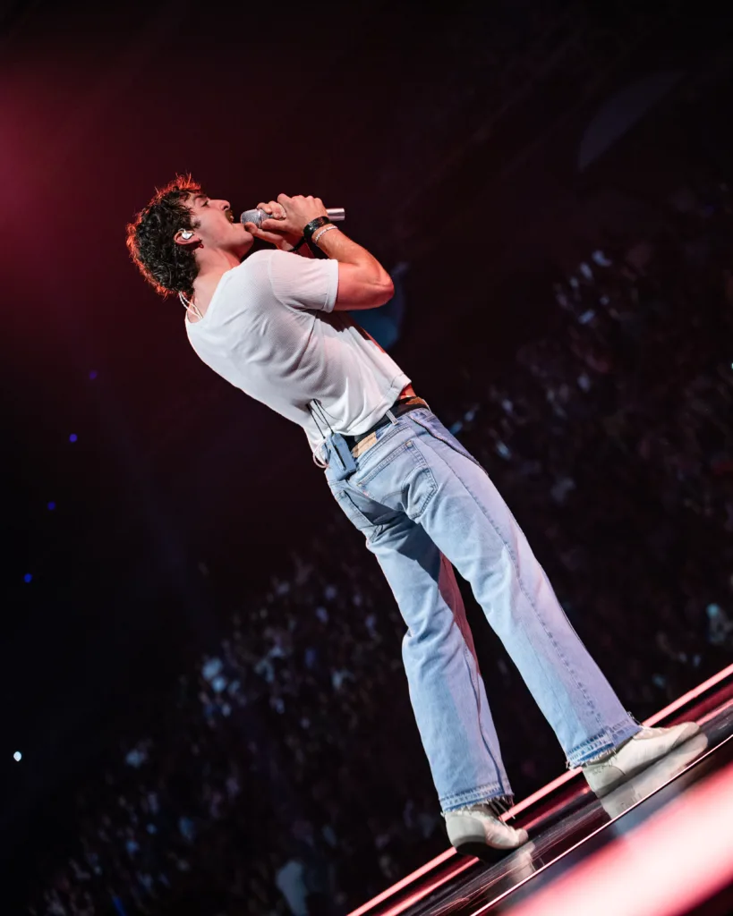 Benson Boone performing live in concert