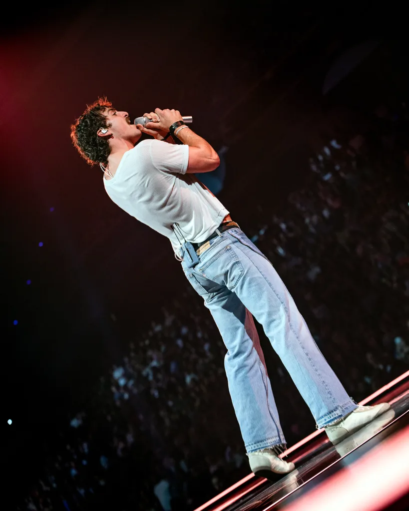 Benson Boone performing live in concert