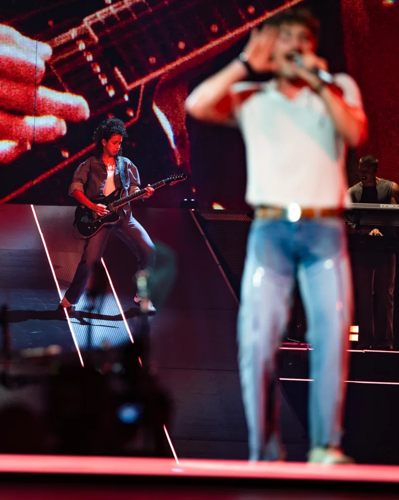 Benson Boone performing live in concert